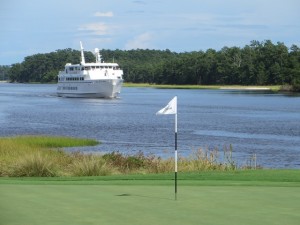 Cruise ship coming by the 18th green at Glen Dornoch.